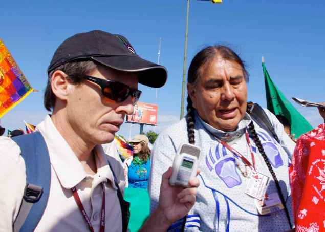 Leahy int Tom Goldtooth sml - cancun march - renee leahy 2010